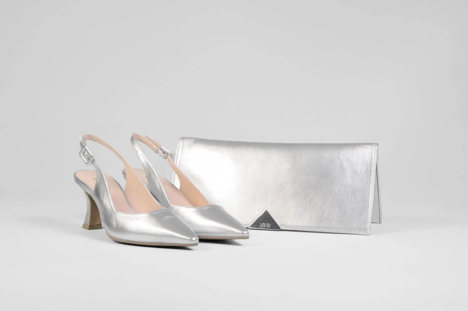 Lodi - Juco Silver Slingback with a kitten heel